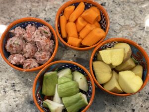 albondigas ingredients, carrots, pork meatballs, chayotes, potatoes